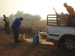 Firefighter refilling with water